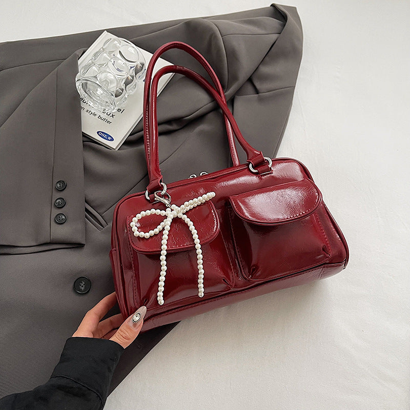 Glossy Charm Bow Tote – Stylish Patent Handbag with Pearl Accent