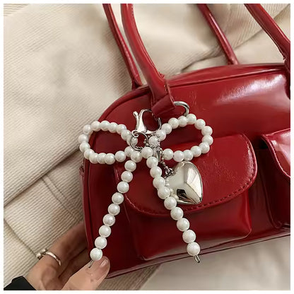 Glossy Charm Bow Tote – Stylish Patent Handbag with Pearl Accent